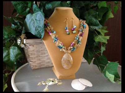 7. Citrine Chips & Teardrop with Jewel-Toned Mother-of-Pearl Nuggets $59.95 Earrings $14.95 7. Citrine Chips & Teardrop with Jewel-Toned Mother-of-Pearl Nuggets