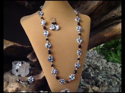 20. Black & White Acrylic w/Firepolished Glass $34.95 Bracelet $16.95 Earrings $10.95 20. Black & White Acrylic w/Firepolished Glass